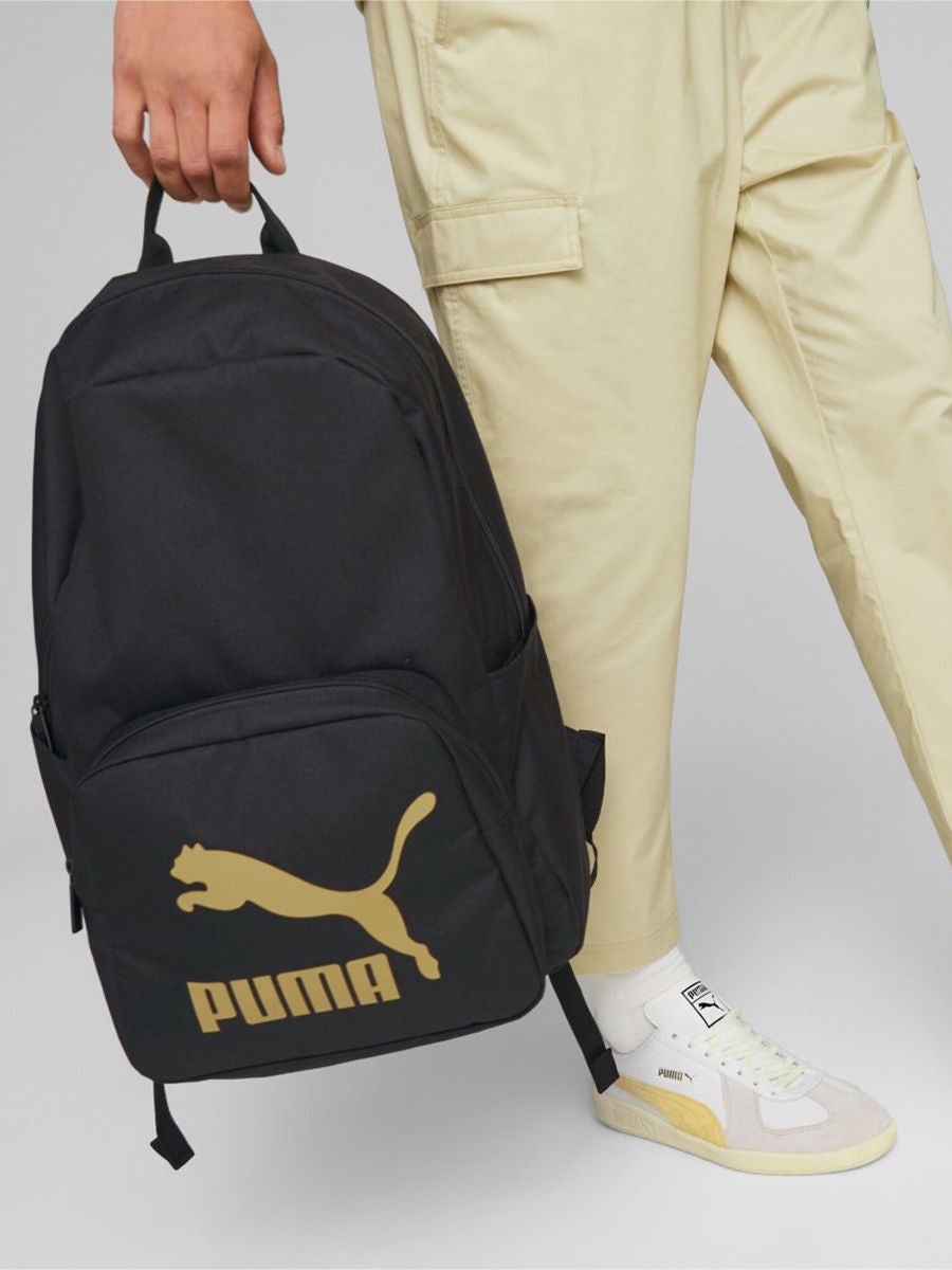 Black and 2024 gold pumas khaki