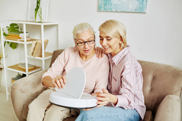 mom with robot vacuum