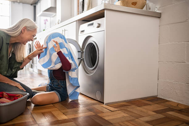 mom with washing machine